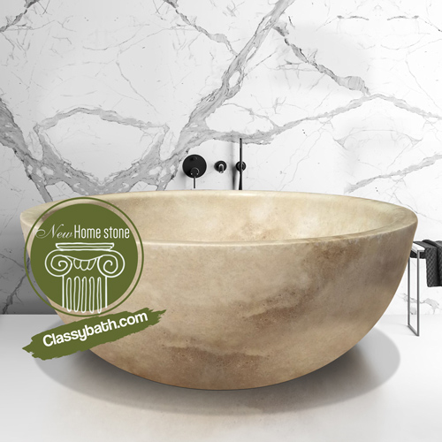 Freestanding stone soaking tub
